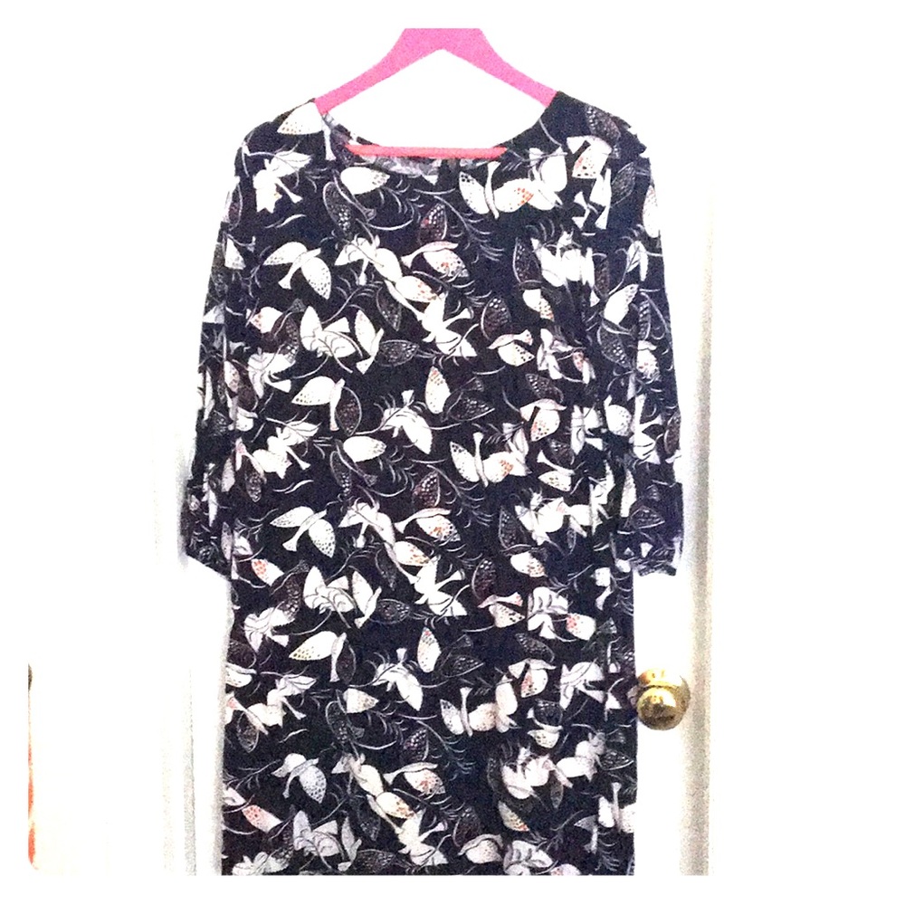 Blue long sleeved dress with dove pattern